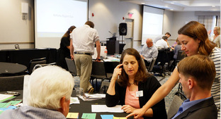 Southeast Michigan Council of Governments Renewable Energy Academy Workshop 9-5-24, Zona Martin to far right.