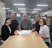 Air Quality permit engineers review a permit application.