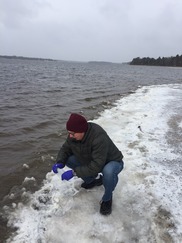 EGLE contractor collects a sample of frozen foam.