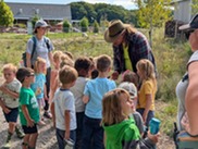 students engage with a naturalist guest speaker