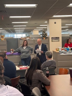 Michelle Bakun receiving 30 Year Award from RRD Director Mike Neller