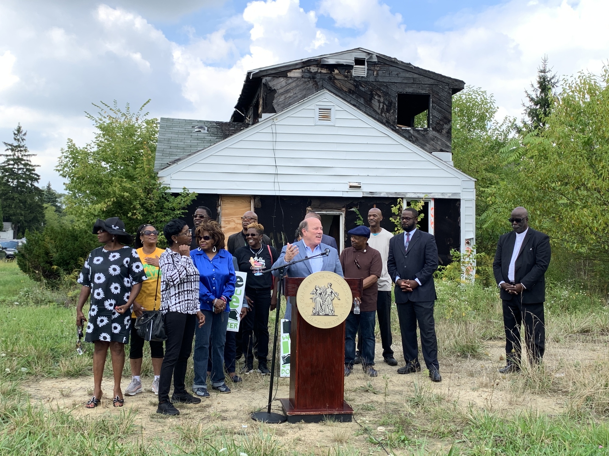 Mayor Duggan with community members at press conference