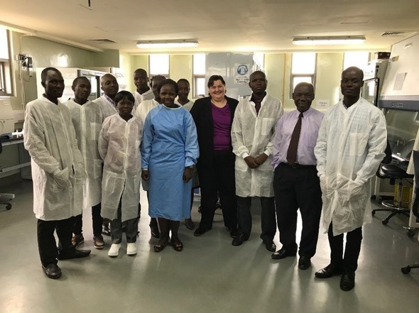 Dr. Soehnlen (center) and the Ugandan CPHL microbiology employees