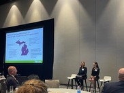 Caitlin Hotchkiss and Mary-Grace Brandt presenting at the Salesforce Innovation Day Conference in Chicago 
