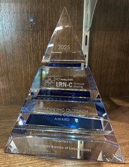 Picture of the award for Outstanding Outreach.