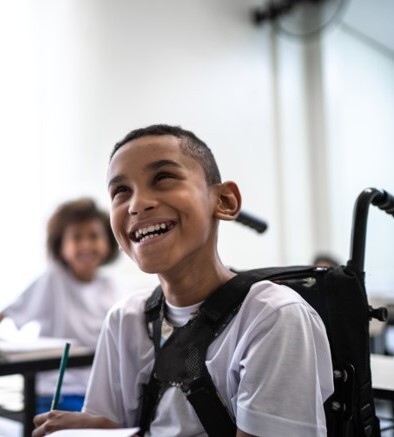 Child in wheelchair at school