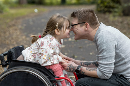 Dad and daughter in wheelchair