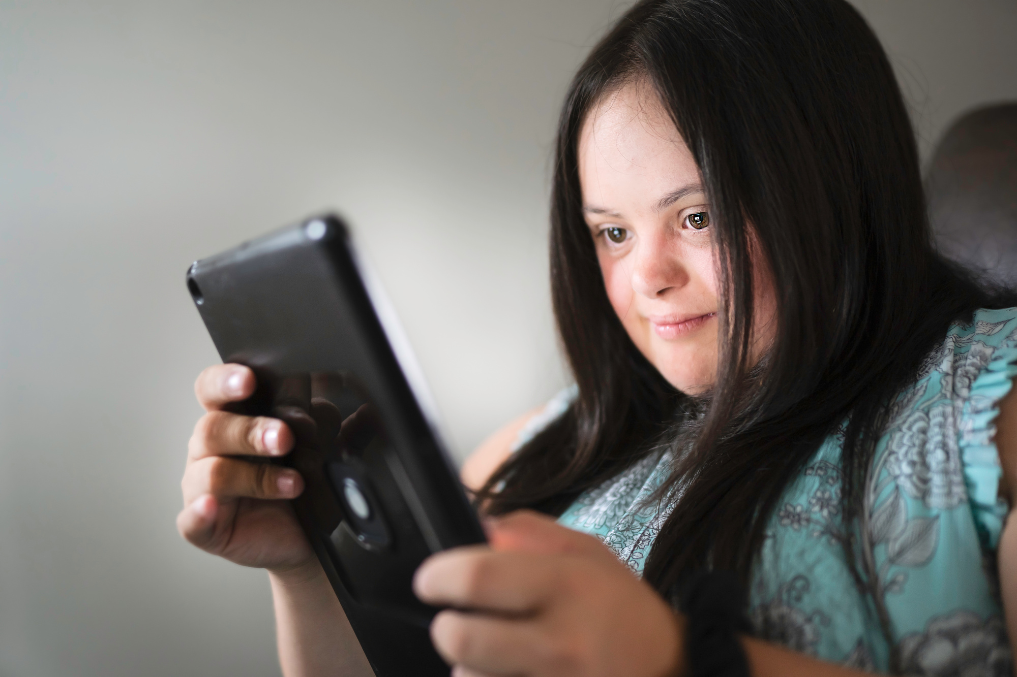 Girl on electronic device