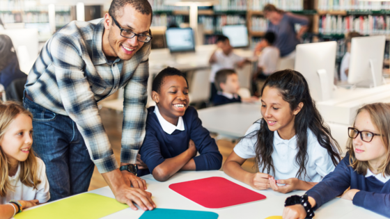 Teacher with students