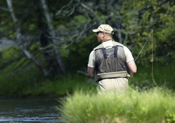 Man fishing in a river