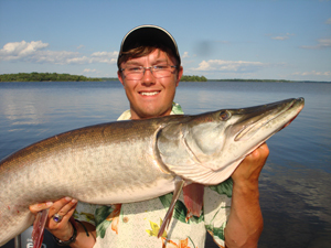 Angler holding up a muskellunge