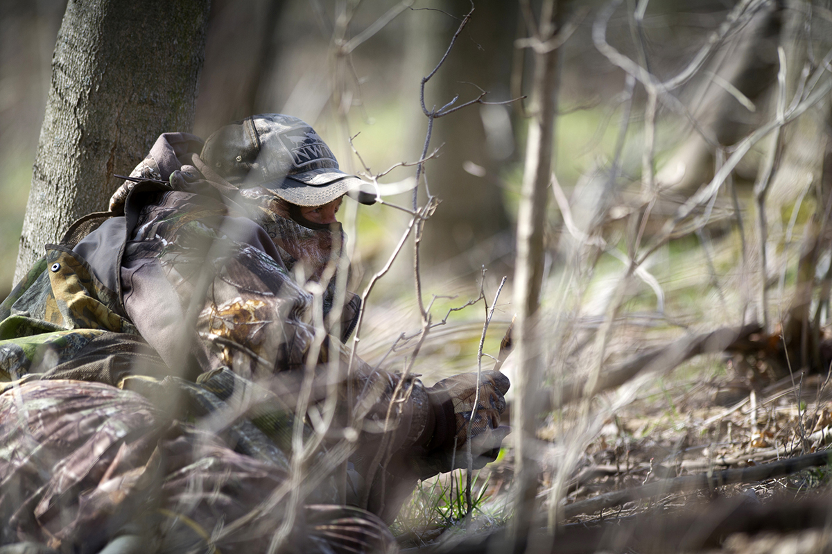 Steve Sharp is shown calling a wild turkey at the Barry State Game Area in Barry County.
