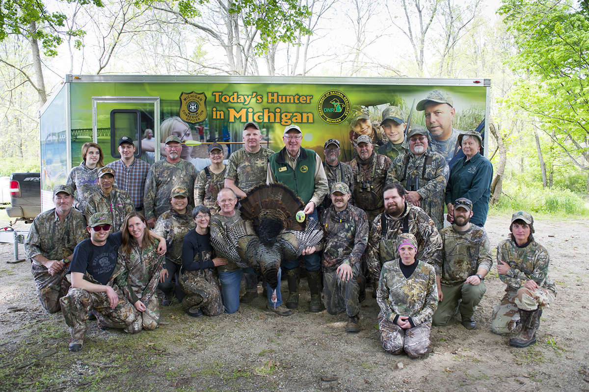 The group gathered for the recent Learn to Hunt outing at the Barry State Game Area poses for a photograph.