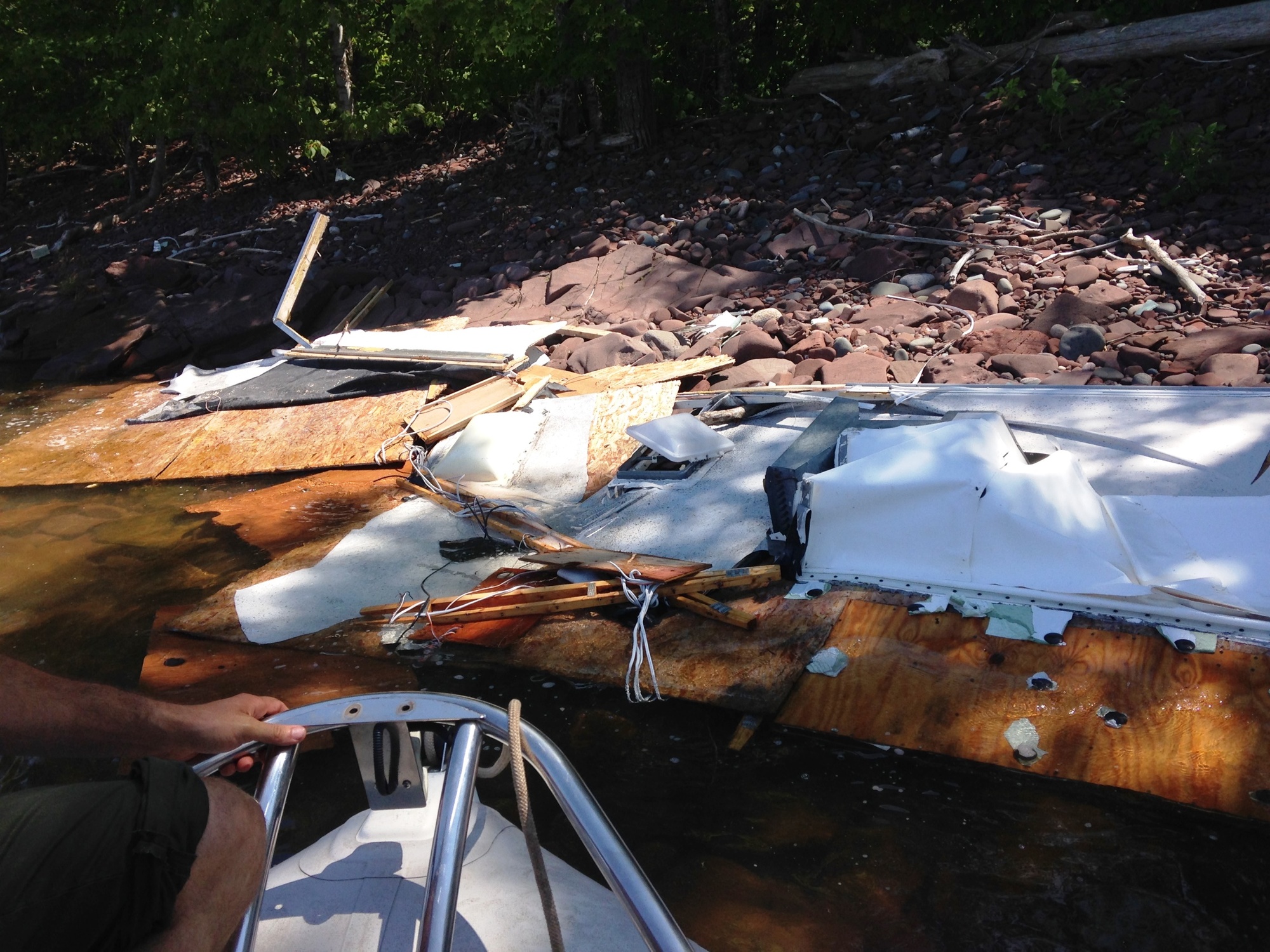 A trailer washed up on the shoreline of Porcupine Mountains Wilderness State Park, believed to be part of the recent storm damage at Saxon Harbor.