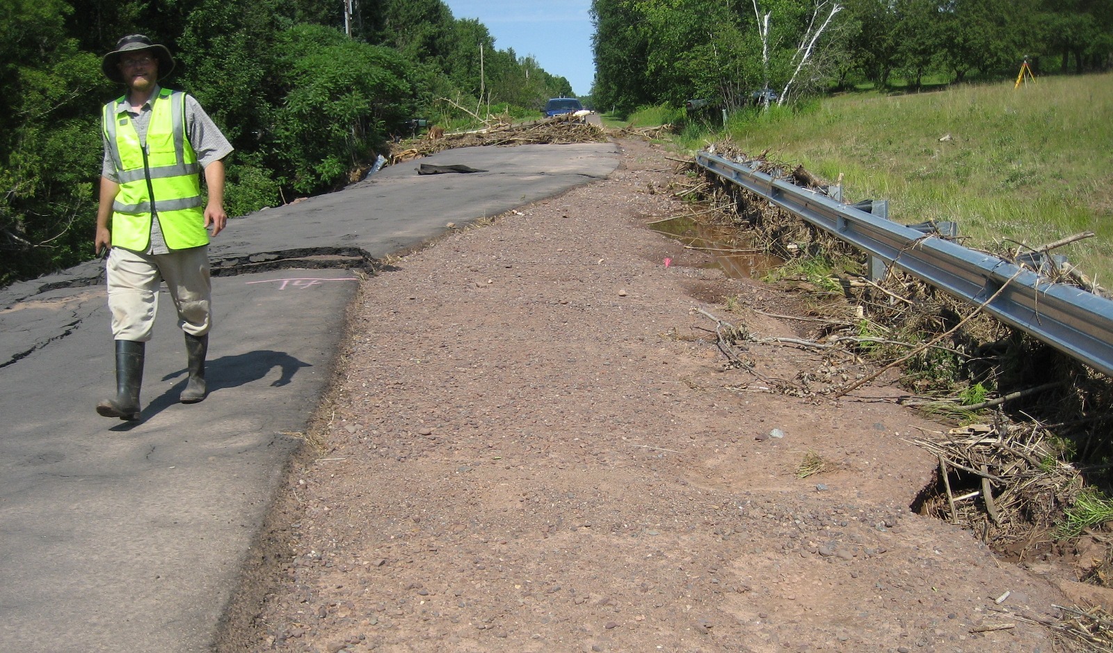 A section of Lake Road at Maki Creek that didn’t wash out, but had flows over the road, as evidenced by the debris stuck in the guard rail.