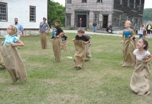 kids participating in sack race at Fayette