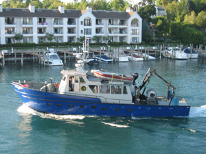Survey Vessel Steelhead heading out from Charlevoix