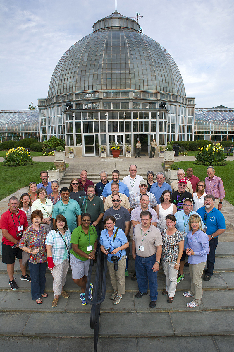 Attendees to the National Association of State Outdoor Recreation Liaison Officers 2016 convention pose for a photo outside the Belle Isle Conservancy