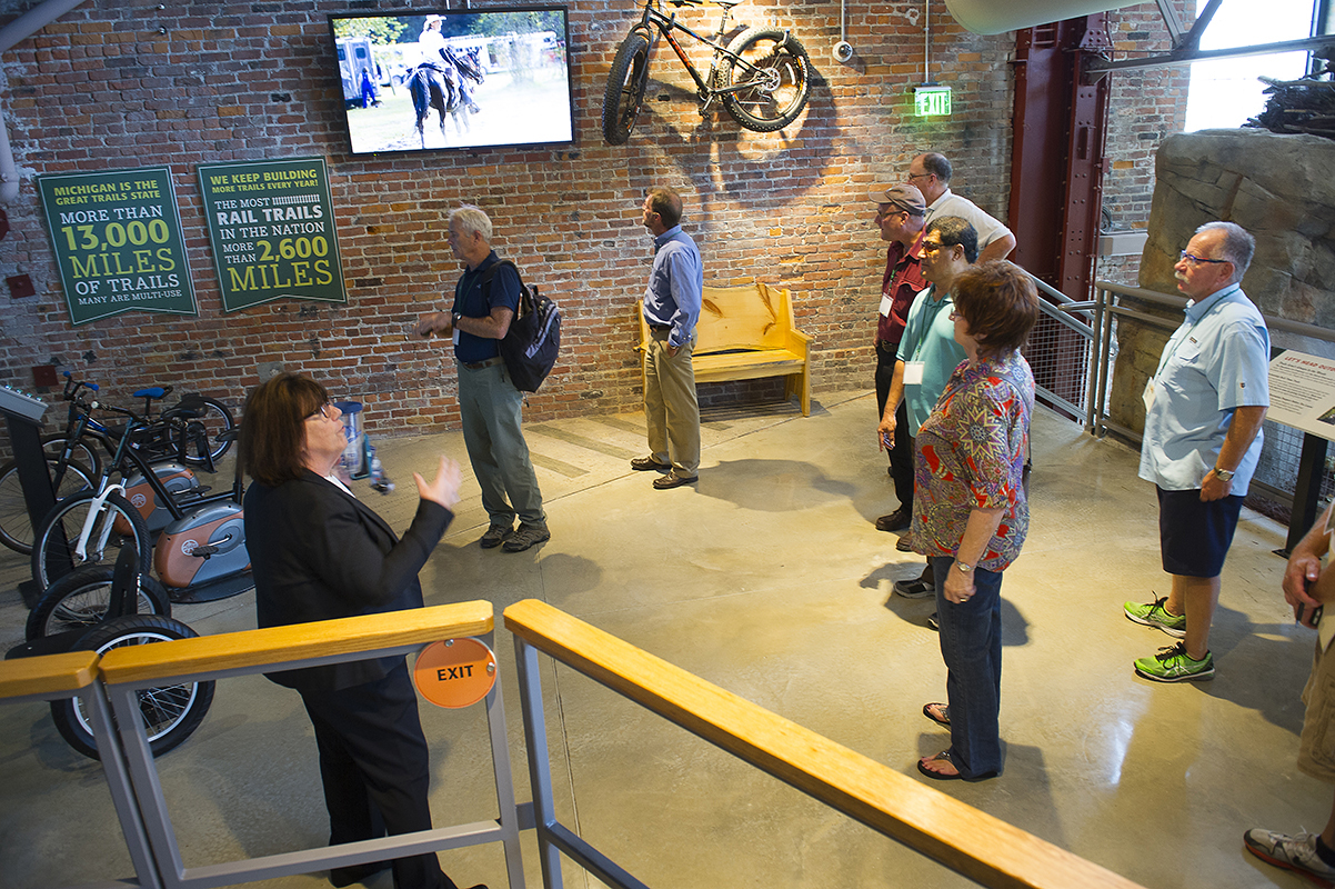 Attendees to the National Association of State Outdoor Recreation Liaison Officers 2016 convention tour the Outdoor Adventure Center in Detroit.