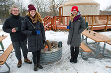 Winter campers at bonfire