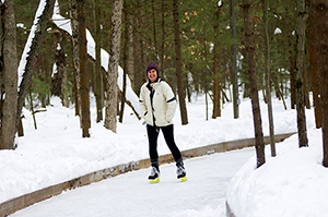 Visitor skating on ice trail at Muskegon State Park