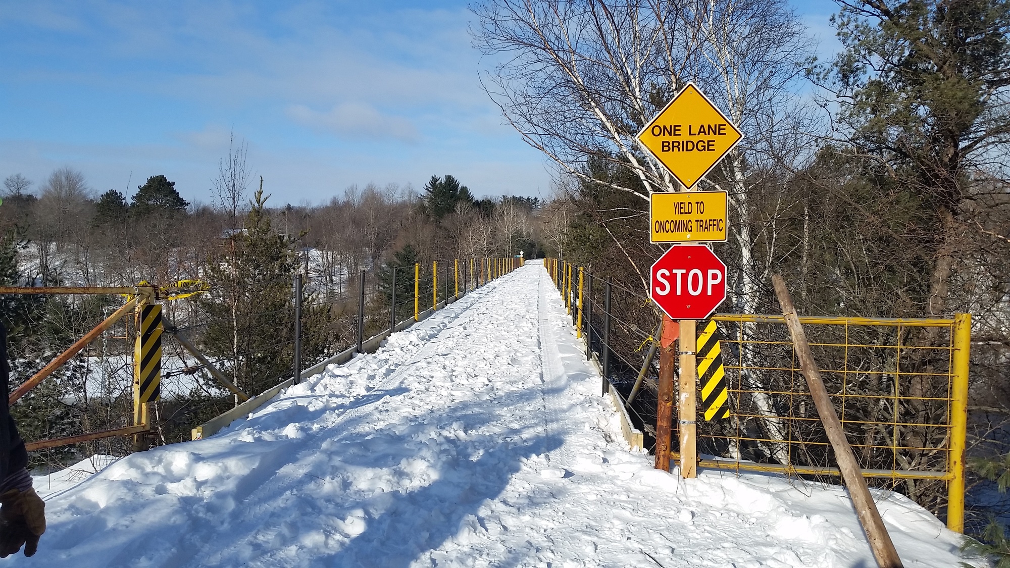 A Snowmobile Trail No. 2 bridge over the Menominee River, at the Michigan-Wisconsin border in Dickinson County, has now been reopened after a closure to make repairs to bridge railings. A Snowmobile Trail No. 2 bridge over the Menominee River, at the Michigan-Wisconsin border in Dickinson County, has now been reopened.