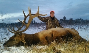 Hunter David Bowman with elk he harvested