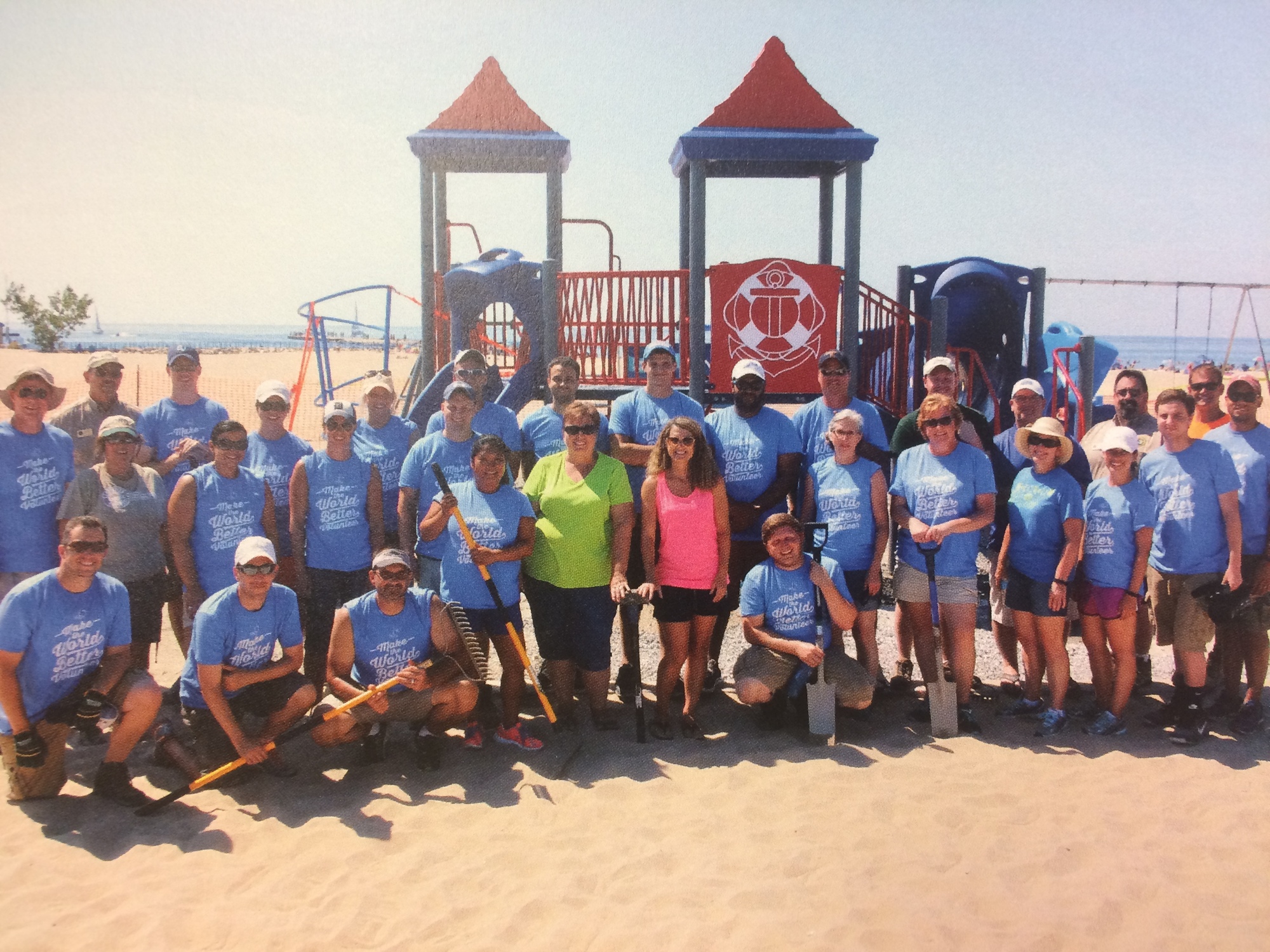 Sally Starr (center left) and Nancy VanEenenaam (center right), were the catalysts for a new playground at Holland State Park. 