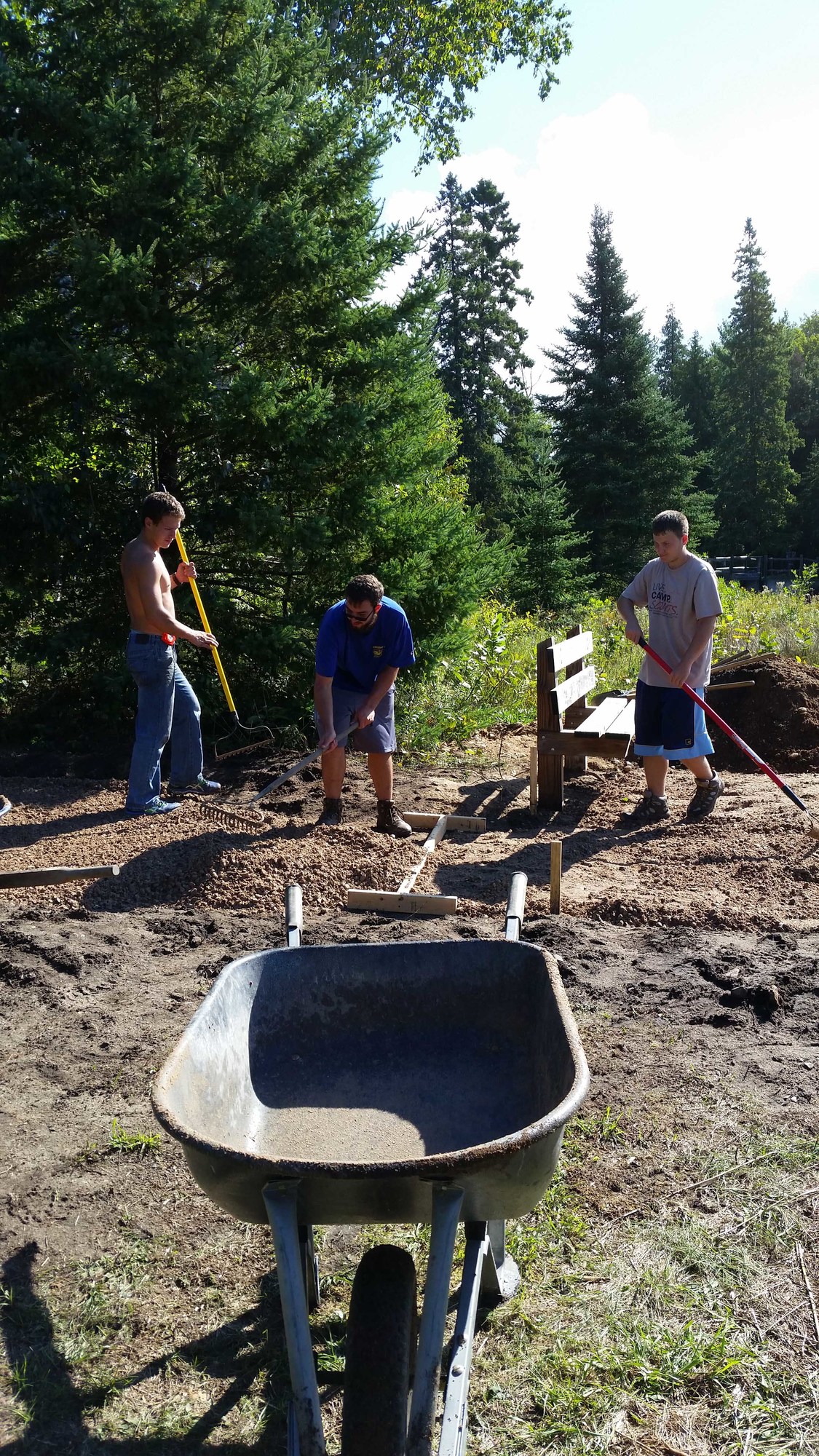 A Scout crew works on an all-accessible pondside trail at Wilderness State Park in Emmet County.