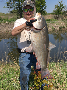 Roy Beasley holding new state record bigmouth buffalo