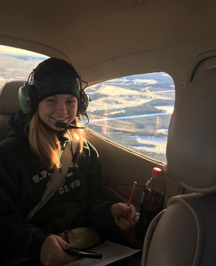 Hannah Peterson on a DNR moose survey.