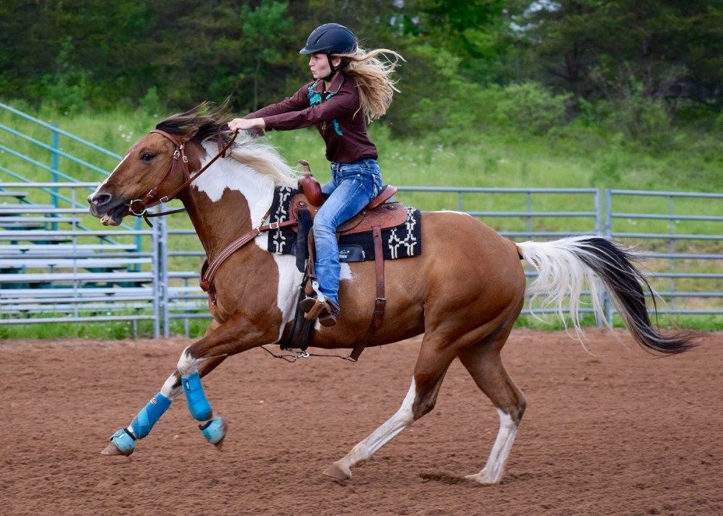Hannah Peterson on her horse, Bailey, during the Great Lakes Rodeo