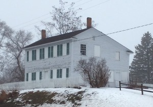 Walker Tavern with boarded-up windows