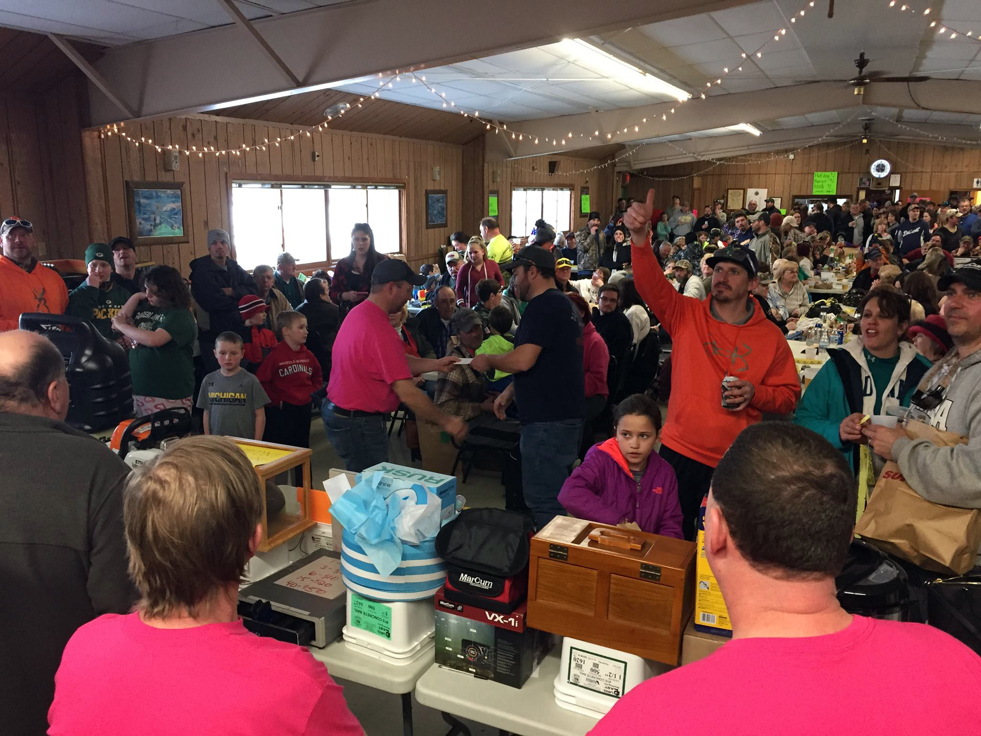 A big crowd is ready for prize distribution at the Wakefield Volunteer Fire Department’s ice fishing contest festivities in Gogebic County.