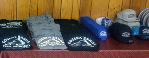 Gogebic Range Trail Authority sweatshirts and other merchandise laid out for the club's fundraising event.