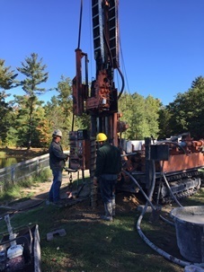 Soil borings from around the Reedsburg Dam were collected to determine the composition and soil layers associated with the earthen berm. 