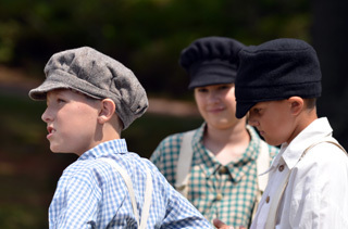 A trio of Future Historians assume their roles at Fort Wilkins Historic State Park.