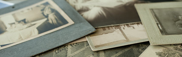 Close-up detail of historic maps, documents and photographs