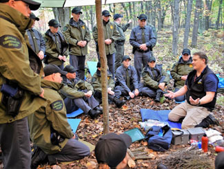 Conservation officers receiving outdoor survival training.