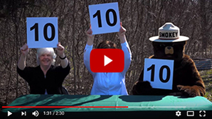 Thumbnail image from a Michigan DNR video that humorously addresses the need for thorough dousing of campfires, especially during high danger times.