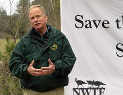 Michigan Department of Natural Resources Director Keith Creagh talks to attendees at the opening of a Turkey Tract.