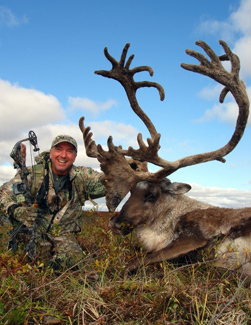 Tom Miranda poses with a trophy caribou he took with a bow, while hunting in Nunavut. (Photo courtesy of Tom Miranda)