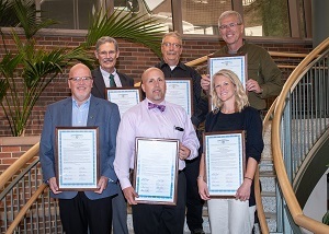 Several members of Michigan's Chronic Wasting Disease Working Group were honored for their efforts at the Aug. 9 Natural Resources Commission meeting