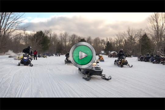snowmobile video play button