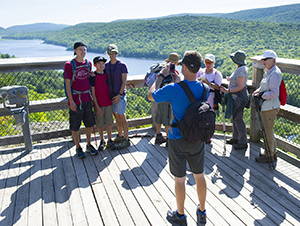 Visitors are shown at the overlook for Lake of the Clouds in Ontonagon County.