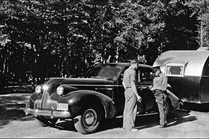 An early park photo show vehicle check-in at a Michigan state park.