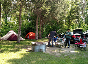 Campers enjoy the day at Oakland County’s Proud Lake State Park in 2018.