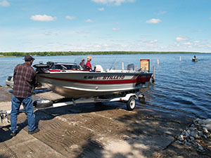 Boaters enjoy the waters of Indian Lake.