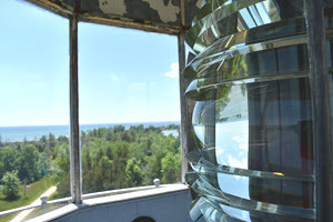 View of Tawas Point from the top of the lighthouse. The fresnel lens is to the right. The view out the window is to the left. 