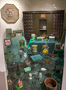 display of green objects from Michigan History Museum collections